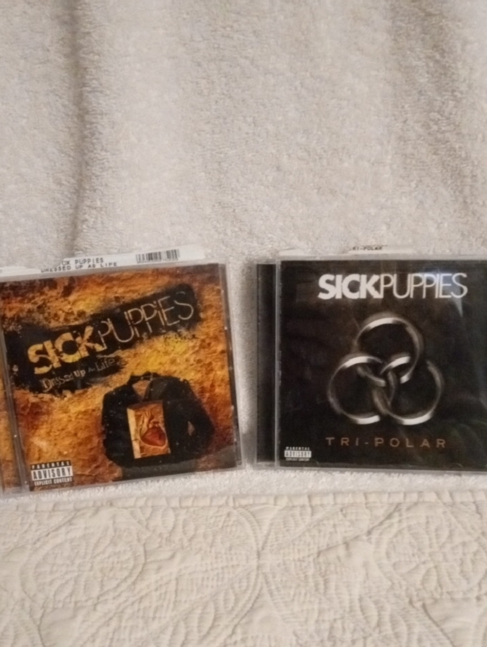 - Tri-Polar & Dressed Up As Life CD Bundle (Black / Brown)